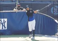  ?? Kathy Willens / Associated Press ?? Yankees DH/OF Giancarlo Stanton swings during a July 5 workout in New York.