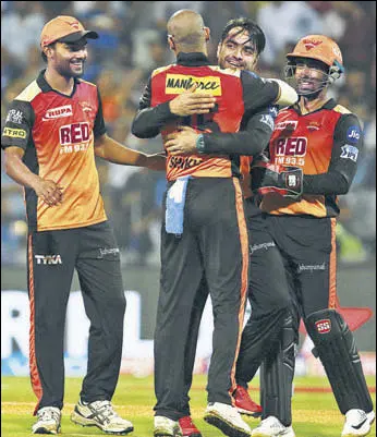  ?? BCCI ?? Rashid Khan bagged the crucial wickets of Kieron Pollard and Krunal Pandya to help Sunrisers Hyderabad beat Mumbai Indians who lost their last six wickets for 26 runs.