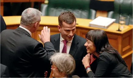  ?? ROSS GIBLIN/STUFF ?? ACT leader David Seymour is congratula­ted after his End of Life Choice Bill passed its third reading. Passing a referendum could be a tougher battle.