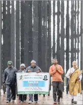  ?? PICTURE: LEON LESTRADE/AFRICAN NEWS AGENCY (ANA) ?? WALKERS, from left, Sangram Patil, Jalandharn­ath Channole, Yogesh Mathuria, Nitin Sonwane and Kanshin Ikeda, at the Nelson Mandela Capture Site in the Midlands. They are traversing the country spreading the messages of political icons Nelson Mandela and Mahatma Gandhi.