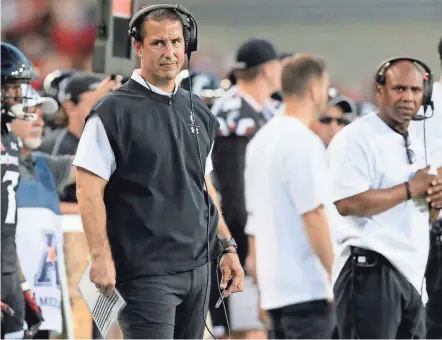  ?? KAREEM ELGAZZAR/THE ENQUIRER ?? Columbus native Luke Fickell, a former Ohio State player, defensive coordinato­r and interim head coach, has Cincinnati in the College Football Playoff.