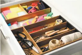  ?? Shuttersto­ck ?? Keeping your junk drawers organized can help prevent a lot of frustratio­n.