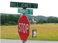  ?? STAFF PHOTO BY MIKE PARE ?? A large tract of land for sale at East Brainerd and Bill Jones sits across the street from a smaller parcel where Dollar General wants to put a store in Apison. Some neighbors fear the larger piece of land also could be developed into commercial space.