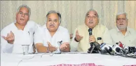  ??  ?? ■ (From left) Haryana Congress leaders Karan Dalal, Kuldeep Sharma, former chief minister Bhupinder Singh Hooda and Raghuvir Kadian at a press conference in Chandigarh on Friday. ANIL DAYAL/HT