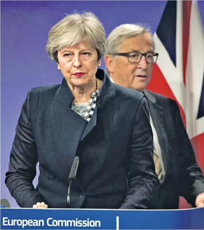  ??  ?? Theresa May and Jean-claude Juncker, the EC president, in Brussels yesterday, where the deadline for talks was extended