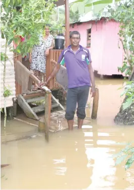  ?? Photo: Ronald Kumar ?? River Road resident of Nasinu, Ajen Kumar stayed in his house as flood water continued to rise.