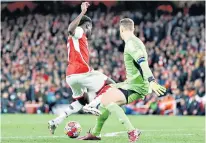  ?? ?? Lifeline: Leandro Trossard equalises for Arsenal, who thought they should have had a late penalty when Bukayo Saka went down after a challenge by keeper Manuel Neuer