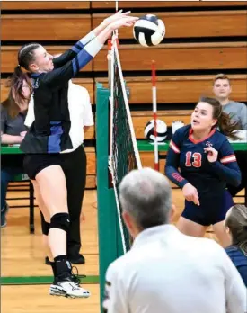  ?? PILOT PHOTO/RON HARAMIA ?? Laville’s Olivia Goze (left) gets the emphatic stuff on this block during the sectional finals Saturday against South Central.