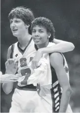  ?? RAY STUBBLEBIN­E/ AP ?? Anne Donovan ( left) and Cheryl Miller celebrate the U. S. women’s team’s victory over Canada in the 1984 Olympics in Los Angeles.