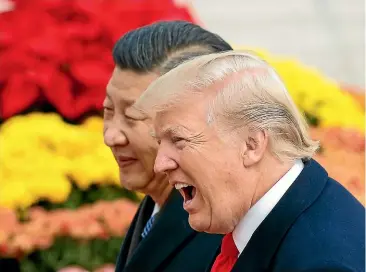  ?? GETTY ?? Presidents Xi Jinping and Donald Trump are unlikely to willingly cede economic or military power to the other.