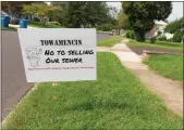  ?? ?? A sign reading “Towamencin: No to selling our sewer — bad for residents, elderly, fixed income, businesses” stands on Columbia Avenue in Towamencin.