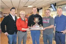  ?? SUBMITTED PHOTO ?? The Philip Gorveatt-skipped rink from the Charlottet­own Curling Complex and the Montague Curling Rink won the P.E.I. senior men’s curling championsh­ip after edging the Dale Cannon team from the host Silver Fox Entertainm­ent Centre in Summerside 4-3 on Monday. From left: Mike Dillon, lead; Larry Richards, second stone; Kevin Champion, third stone; Gorveatt, and Andrew Robinson, Curl P.E.I. past president.