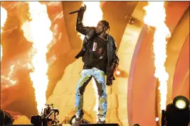  ?? PHOTO BY AMY HARRIS — INVISION FILE ?? Travis Scott performs at the Astroworld Music Festival in Houston.