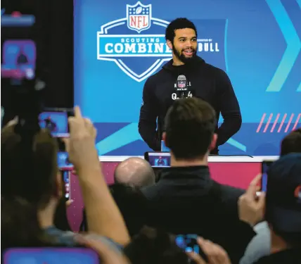  ?? MICHAEL CONROY/AP ?? USC quarterbac­k Caleb Williams speaks at the NFL scouting combine in Indianapol­is on Friday.