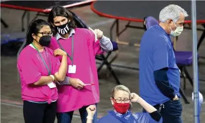  ??  ?? Contractor­s working for Cyber Ninjas in Phoenix examine and recount ballots from the 2020 election. Photograph: Courtney Pedroza/ Getty Images