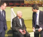  ?? Paul Newberry / Associated Press ?? In this May 5 file photo, Democratic presidenti­al candidate Pete Buttigieg, right, and his husband, Chasten Glezman Buttigieg speak with former President Jimmy Carter at Carter’s Sunday school class in Plains, Ga.