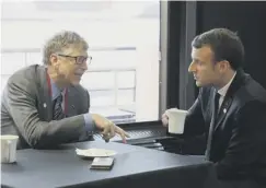  ??  ?? 0 Bill Gates and Emmanuel Macron in discussion