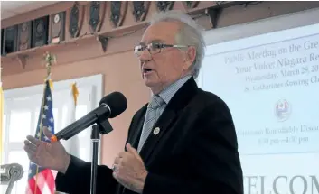  ?? ALLAN BENNER/STANDARD STAFF ?? Internatio­nal Joint Commission Canadian chair Gordon Walker addresses more than a hundred people who attended a public meeting on the Great Lakes in St. Catharines on Wednesday.