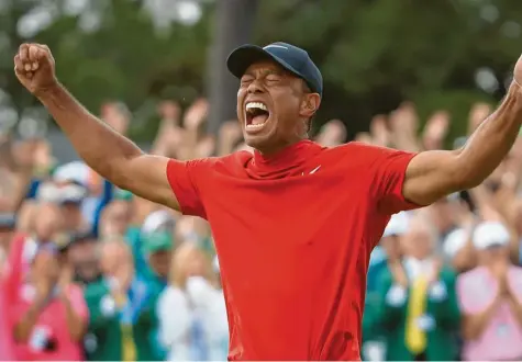  ?? Foto: Andrew Redington, afp ?? Der Jubel des Champs: Tiger Woods hat das traditions­reiche Masters in Augusta gewonnen.