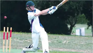  ??  ?? It’s a big swing and a miss for Bunyip’s Jake Stewart in the division four match against Jindivick. Bunyip posted a competitiv­e total on the first day; Photograph: Paul Cohen.