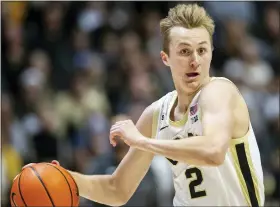  ?? DOUG MCSCHOOLER — THE ASSOCIATED PRESS ?? Former Clarkston standout Fletcher Loyer and Purdue are ranked No. 1in the AP Top 25.