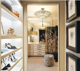  ??  ?? Well-lit display shelves and tastefully framed art lines the passageway leading from the dressing room in the Kips Bay Decorator Showcase project to the master bathroom, which appears equally glamorous.