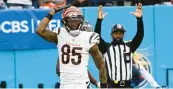  ?? MARK ZALESKI/AP ?? Tee Higgins celebrates after his TD catch in the Bengals’ 20-16 road victory against the Titans on Sunday.