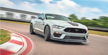  ?? FORD MOTOR CO. ?? After a 17-year hiatus, the 2021 Mustang Mach 1 is on sale. Base price is $51,720 plus $1,195 in charges.