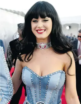  ?? FRAZER HARRISON/Getty Images ?? Katy Perry, you’re no Janis Joplin. In the new world of poptimism, critics are quick to hail
almost any CD as on the same level with true gems of the rock canon.