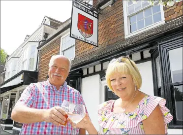  ??  ?? Ray Pratt and his business partner Sarah Cleaton outside their pub in August 2018