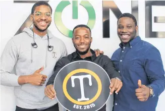  ?? DANIEL BROWN/SALTWIRE NETWORK ?? Daniel Ohaegbu, Jonah Chininga and Joshua Daniels are currently working from the Startup Zone on Queen Street in downtown Charlottet­own. Missing is Oniel Kuku, who heads operations and graphic design for the company.