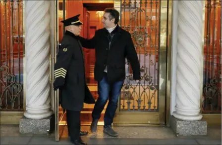  ?? RICHARD DREW — THE ASSOCIATED PRESS ?? Michael Cohen, former lawyer to President Donald Trump, leaves his apartment building on New York’s Park Avenue, Friday. In the latest filings Friday, prosecutor­s will weigh in on whether Cohen deserves prison time and, if so, how much.