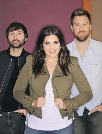  ?? MARK HUMPHREY/THE ASSOCIATED PRESS ?? The members of Lady Antebellum include Dave Haywood, left, Hillary Scott, and Charles Kelley. The country trio’s latest record Heart Break arrives after a two-year hiatus.