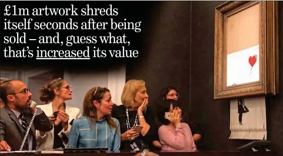  ??  ?? SHOCK: Stunned auction-goers watch as the famous artwork starts shredding itself just after being sold