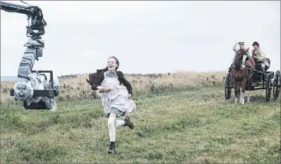  ?? CHRIS REARDON/SPECIAL TO THE GUARDIAN ?? Amybeth McNulty runs towards a camera during a shooting for the second season of “Anne”. The CBC TV series will return for 10 episodes in 2018.
