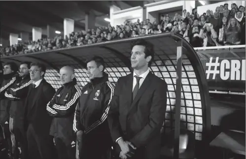  ?? Photo: VCG ?? Real Madrid’s interim coach Santiago Solari (right) waits for the start of their match against Melilla in the Spanish enclave of Melilla on Wednesday.