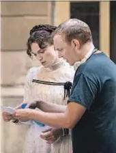  ?? Robert Viglasky Bleecker Street ?? KEIRA KNIGHTLEY in costume with “Colette” director Wash Westmorela­nd.