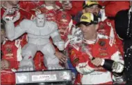  ?? NICK WASS — THE ASSOCIATED PRESS ?? Kevin Harvick celebrates with champagne in Victory Lane after he won the NASCAR Sprint Cup series auto race Sunday at Dover Internatio­nal Speedway in Dover, Del.