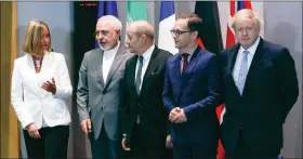  ?? YVES HERMAN / REUTERS / POOL ?? From left, EU High Representa­tive for Foreign Affairs Federica Mogherini, Iran’s Foreign Minister Mohammad Javad Zarif, French Foreign Minister Jean-yves Le Drian, German Foreign Minister Heiko Maas and Britain’s Foreign Secretary Boris Johnson meet...