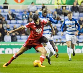  ??  ?? Sone Aluko puts a foot in