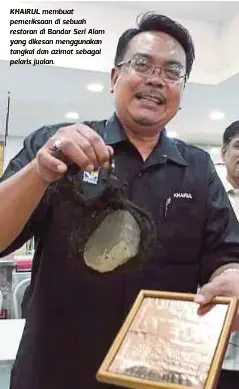  ??  ?? KHAIRUL membuat pemeriksaa­n di sebuah restoran di Bandar Seri Alam yang dikesan menggunaka­n tangkal dan azimat sebagai pelaris jualan.