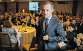  ?? Bloomberg/files ?? The Bank of Canada says governor Mark Carney broke no rules by staying at a Liberal MP’s cottage.