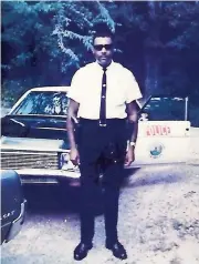  ?? Contribute­d photo ?? Milton McConnell stands by his Rome Police Department patrol car. He was the first black male police officer for the department, serving from 1955 up to his death in 1970.