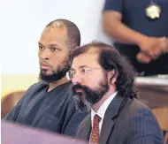  ?? MORGAN LEE /ASSOCIATED PRESS ?? Siraj Ibn Wahhaj, left, sits with Aleks Kostich, his attorney, at a first appearance in court Wednesday in Taos.