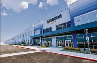  ?? NICK GRAHAM / STAFF ?? Amazon announced this week it is hiring more than 750 primarily full-time employees for its new fulfillmen­t center in Monroe. Company officials say the opening of a facility typically follows about a month after the start of hiring efforts.