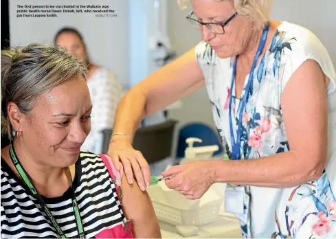  ?? WAIKATO DHB ?? The first person to be vaccinated in the Waikato was public health nurse Dawn Tamati, left, who received the jab from Leanne Smith.