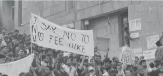  ??  ?? JNU students protest against fee hike