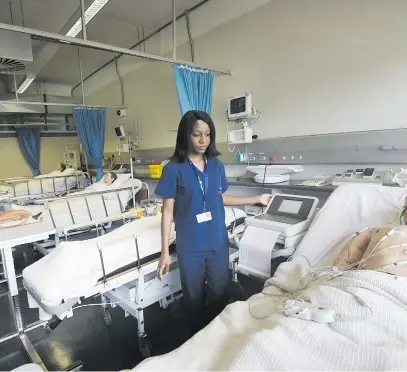  ?? Picture: Nigel Sibanda ?? REAL LEARNING. University of Johannesbu­rg final-year emergency medical care student Chrida Nkuna at the Philips Clinical Simulation Laboratory at the university this week.The laboratory contribute­s to hands-on training by providing accurate simulation­s in replicated medical emergency settings.