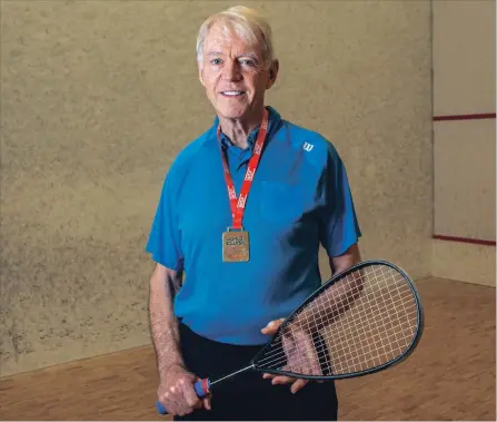  ?? ANDREJ IVANOV WATERLOO REGION RECORD ?? Howard Armitage, a University of Waterloo business professor, won his first world masters squash title last weekend. At age 75, Armitage is eager to defend his title in 2020. “I love playing, it’s a way to stay healthy and I enjoy the competitio­n,” he says.