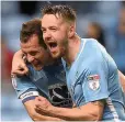  ??  ?? Marc McNulty celebrates